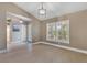 Bright dining area with window and view of entryway at 610 Renner Rd, Port Orange, FL 32127