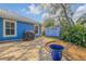 Charming backyard patio with grill and shed at 610 Renner Rd, Port Orange, FL 32127