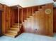 Wooden staircase in the living room at 634 N Riverside Dr, New Smyrna Beach, FL 32168