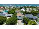 Aerial view of a neighborhood near the ocean, featuring beach access at 6345 River Rd, New Smyrna Beach, FL 32169