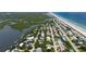 Aerial view showing home's location near water at 6345 River Rd, New Smyrna Beach, FL 32169