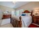 Comfortable bedroom with a king-size bed and private access to balcony at 6345 River Rd, New Smyrna Beach, FL 32169