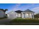 Charming single-story home with gray siding and a covered porch at 6807 Ragatz Ln, Port Orange, FL 32128