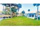 Large backyard with firepit and screened enclosure at 69 E Bayshore Dr, Port Orange, FL 32127