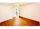 Bright bedroom with wood-look floors and ample closet space at 69 E Bayshore Dr, Port Orange, FL 32127