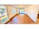 Bright dining room with sliding doors to a sunroom at 69 E Bayshore Dr, Port Orange, FL 32127