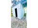 Small metal storage shed in the backyard at 69 E Bayshore Dr, Port Orange, FL 32127