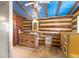 Rustic bathroom with log cabin walls and a unique ceiling at 735 S Glencoe Rd, New Smyrna Beach, FL 32168