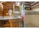 Simple bathroom with shower and rustic vanity at 735 S Glencoe Rd, New Smyrna Beach, FL 32168