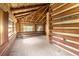 Secluded log cabin bonus room with log walls and windows at 735 S Glencoe Rd, New Smyrna Beach, FL 32168