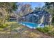 Long, screened pool ideal for laps and recreation at 735 S Glencoe Rd, New Smyrna Beach, FL 32168