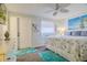 This bright bedroom is decorated with sea-life accents and features an exterior door at 8 Ocean Dr, Ormond Beach, FL 32176