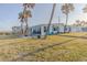 Exterior of a coastal home with a patio and beach views at 8 Ocean Dr, Ormond Beach, FL 32176