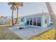 Outdoor patio with a picnic table and beach views at 8 Ocean Dr, Ormond Beach, FL 32176