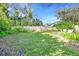 Large grassy backyard with a white fence at 806 E 21St Ave, New Smyrna Beach, FL 32169