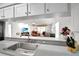 Kitchen sink and counter space overlooking the Gathering room at 806 E 21St Ave, New Smyrna Beach, FL 32169