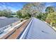 Home features solar panels on metal roof at 806 E 21St Ave, New Smyrna Beach, FL 32169