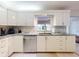 Kitchen view with ample cabinet space, stainless steel appliances and granite countertops at 808 E 19Th Ave, New Smyrna Beach, FL 32169