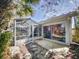 Cozy sunroom with glass walls offering a bright space for relaxing or entertaining at 808 E 19Th Ave, New Smyrna Beach, FL 32169