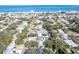 An aerial view of the neighborhood with mature trees near the beach at 817 E 12Th Ave, New Smyrna Beach, FL 32169