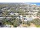 Aerial view of the neighborhood with mature trees and proximity to ocean at 817 E 12Th Ave, New Smyrna Beach, FL 32169