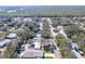 Overhead view of the neighborhood showing tree coverage throughout the community at 817 E 12Th Ave, New Smyrna Beach, FL 32169