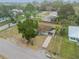 Aerial view of a single-story house with a yard at 904 Wilkins St, New Smyrna Beach, FL 32168