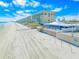 Aerial view of beachfront property and nearby oceanfront restaurant at 91 Maura Ter, Ponce Inlet, FL 32127