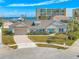 Single-story home with ocean views, light-colored siding, and a paved driveway at 91 Maura Ter, Ponce Inlet, FL 32127