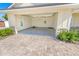 Attached garage with epoxy flooring at 91 Maura Ter, Ponce Inlet, FL 32127