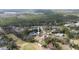 Great aerial shot of the home and the lush green golf course in a mature and friendly community at 958 Beach Fern Ct, New Smyrna Beach, FL 32168