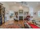 Open-concept living room features vaulted ceilings, a fireplace, and hardwood floors at 958 Beach Fern Ct, New Smyrna Beach, FL 32168