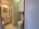 Bathroom featuring a functional vanity sink and a glass enclosed shower at 105 10Th St, New Smyrna Beach, FL 32168