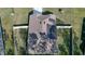 Drone view of the roof that features solar panels on a well-maintained single-story home with a fenced backyard at 114 Sunset Point Dr, Ormond Beach, FL 32174