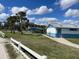 Community amenities include picnic pavilion, restrooms, and green space with sidewalks and lush landscaping at 128 Orange Ave, Edgewater, FL 32132