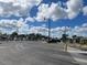 Boat trailer parking area with streetlights and easy access to the community boat ramp at 128 Orange Ave, Edgewater, FL 32132