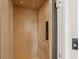 Interior shot of the elevator featuring wood paneling, lighting, and controls at 13 Arena Blanca, Ponce Inlet, FL 32127