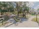 Edgewater Condominiums entrance featuring pedestrian access and community signage at 150 Wax Myrtle Woods Ct # 7B, Deltona, FL 32725