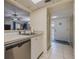 Clean kitchen with a stainless steel dishwasher and tile flooring at 150 Wax Myrtle Woods Ct # 7B, Deltona, FL 32725