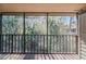 View from the screened patio showcasing the lush green scenery and privacy at 150 Wax Myrtle Woods Ct # 7B, Deltona, FL 32725