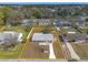 Aerial view highlighting the property boundaries and surrounding landscape at 1935 Fern Palm Dr, Edgewater, FL 32141