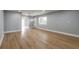 Bright living room featuring new flooring, fresh paint, recessed lighting, and ample natural light at 1935 Fern Palm Dr, Edgewater, FL 32141