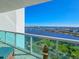 Balcony view featuring a waterfront, beautiful blue skies and a distant cityscape over the water at 231 Riverside Dr # 1509-1, Daytona Beach, FL 32117