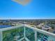 Condo balcony offering scenic city views with glass railings and outdoor seating at 231 Riverside Dr # 1509-1, Holly Hill, FL 32117