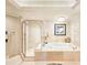 Bright bathroom with a large tub, glass shower, and tile flooring at 231 Riverside Dr # 1509-1, Holly Hill, FL 32117