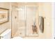 Modern bathroom featuring a glass-enclosed shower and neutral finishes at 231 Riverside Dr # 1509-1, Holly Hill, FL 32117