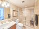 Bathroom featuring a glass shower, modern fixtures, and a neutral color scheme at 231 Riverside Dr # 1509-1, Holly Hill, FL 32117