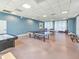 Spacious game room featuring ping pong tables, providing entertainment and recreational activities for residents at 231 Riverside Dr # 1509-1, Holly Hill, FL 32117