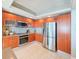 Contemporary kitchen featuring ample cabinet space, stainless steel appliances, and recessed lighting at 231 Riverside Dr # 1509-1, Holly Hill, FL 32117
