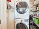 Convenient laundry area with stacked washer and dryer at 231 Riverside Dr # 1509-1, Holly Hill, FL 32117